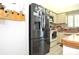 Modern kitchen featuring stainless steel appliances, light cabinetry, and a functional layout at 4078 Salem Square Pkwy, Palm Harbor, FL 34685