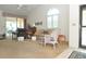 Bright living room with ample seating and a view of the outdoors, creating a relaxing atmosphere at 4078 Salem Square Pkwy, Palm Harbor, FL 34685