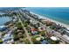 Aerial view of the home in a lush neighborhood near the beach at 5 158Th Ave, Redington Beach, FL 33708