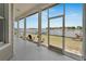 Screened-in porch with views of the water at 5205 Brighton Shore Dr, Apollo Beach, FL 33572