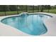 Inviting pool with a small waterfall feature and meticulously kept patio area at 6024 162Nd E Ave, Parrish, FL 34219