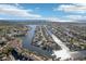 Stunning aerial view of a waterfront community with houses nestled along canals leading to the ocean at 6315 Newtown Cir # 15B3, Tampa, FL 33615