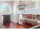 Elegant home foyer featuring chandelier, high ceilings, and large windows at 6413 Maclaurin Dr, Tampa, FL 33647