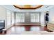 Bedroom with lots of sunlight, hardwood floors, and walk-in closet at 6413 Maclaurin Dr, Tampa, FL 33647