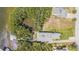 Aerial view of the property with a dock and potential space for a boat at 734 Weedon Ne Dr, St Petersburg, FL 33702