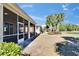 Spacious backyard, with landscaping and views of the lake at 830 Regal Manor Way # 1, Sun City Center, FL 33573