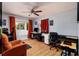 Spacious room with seating area and bay window with natural light at 8871 94Th St, Seminole, FL 33777