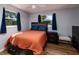 Inviting bedroom features warm colors and two bright windows for natural light at 8871 94Th St, Seminole, FL 33777
