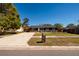 Inviting home exterior showcasing a manicured lawn and a stone-clad mailbox at 8871 94Th St, Seminole, FL 33777
