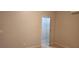 Neutral bedroom with an air conditioning unit, walk-in closet, and tile floors at 2108 Ridgemore Dr, Valrico, FL 33594