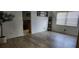 Bright living room with new vinyl flooring and neutral paint colors, perfect for showcasing your personal style at 2108 Ridgemore Dr, Valrico, FL 33594