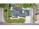 Bird's eye view of the property, highlighting its layout and manicured grounds at 1102 N Albany Ave, Tampa, FL 33607
