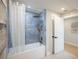 Stylish bathroom features a tiled shower and tub combo and modern fixtures at 1102 N Albany Ave, Tampa, FL 33607
