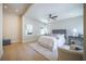 Light and airy bedroom features a stylish rug, comfortable queen bed and soft, neutral color palette at 1102 N Albany Ave, Tampa, FL 33607