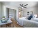 Neutral bedroom with a closet, work desk and bed perfect for any growing  at 1102 N Albany Ave, Tampa, FL 33607