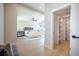 Bright bedroom featuring a ceiling fan, hardwood floors, and natural light at 1102 N Albany Ave, Tampa, FL 33607