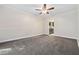A bright bedroom featuring fresh paint and trim with an attached bathroom at 12605 Catamaran Pl, Tampa, FL 33618