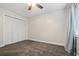 A cozy bedroom featuring a large closet and natural light at 12605 Catamaran Pl, Tampa, FL 33618