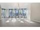 Bright dining area featuring tile floors, recessed lighting, and sheer curtains at 12605 Catamaran Pl, Tampa, FL 33618