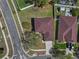 Aerial view of home showing lawn, mature landscaping and proximity to neighboring houses in community at 12802 Lake Vista Dr, Gibsonton, FL 33534