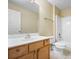Bathroom featuring tile flooring, wood vanity, and shower-tub combination at 12802 Lake Vista Dr, Gibsonton, FL 33534