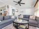 Comfortable living room with gray couches, a modern coffee table, and a cozy atmosphere at 1528 W River Shore Way, Tampa, FL 33603