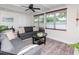 Bright living room featuring neutral tones, stylish furniture, and ample natural light at 1528 W River Shore Way, Tampa, FL 33603