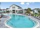 Resort-style pool with sun loungers and dining areas, perfect for outdoor enjoyment at 20723 Balsam Hill Rd, Land O Lakes, FL 34638