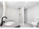 Tastefully remodeled bathroom with shower and decorative, patterned tile floors at 2451 38Th N Ave, St Petersburg, FL 33713