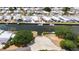 An aerial view of a waterfront community with boats docked along the canal at 272 S Port Royal Ln, Apollo Beach, FL 33572