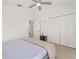 Bedroom featuring a ceiling fan, closet, and carpeted floors at 2944 Billingham Dr, Land O Lakes, FL 34639