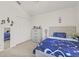Bedroom featuring soft carpet, closet, and matching white furniture at 2944 Billingham Dr, Land O Lakes, FL 34639