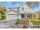 Charming two-story home with well-kept lawn and landscaping, located in a lovely neighborhood at 2944 Billingham Dr, Land O Lakes, FL 34639