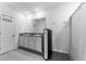 Bathroom with double vanity, granite countertop, and a shower with bathtub at 30753 Penny Surf Loop, Wesley Chapel, FL 33545