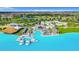 Beautiful resort-style community pool with luxury cabanas and lounge seating, perfect for relaxation and entertainment at 30753 Penny Surf Loop, Wesley Chapel, FL 33545