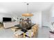 Open concept dining room and kitchen, perfect for entertaining guests at 30753 Penny Surf Loop, Wesley Chapel, FL 33545