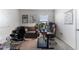 Office with comfortable seating, workspace, and a desk filled with natural lighting from the window at 30753 Penny Surf Loop, Wesley Chapel, FL 33545