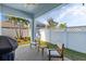 Covered patio featuring pavers, outdoor furniture, a grill and providing a perfect outdoor dining and relaxation space at 318 Blackrock Ln, Apollo Beach, FL 33572