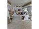 Bright, open kitchen space with cabinets, a blank canvas for a modern remodel at 319 Linden Dr, Ellenton, FL 34222