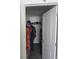 Walk-in closet with ample storage for clothing and shoes, keeping the bedroom tidy and organized at 36562 Silver Maize Dr, Dade City, FL 33525