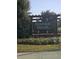 Welcome to Heritage Hills. Community sign nestled among lush greenery at 36562 Silver Maize Dr, Dade City, FL 33525