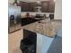 Stylish kitchen boasting granite countertops and stainless steel appliances at 36562 Silver Maize Dr, Dade City, FL 33525