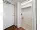 Entry way with tile and hardwood flooring, closet, and secured front door at 5200 Brittany S Dr # 1503, St Petersburg, FL 33715