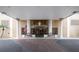 Exterior shot of a condo building's front entrance with benches at 5200 Brittany S Dr # 1503, St Petersburg, FL 33715