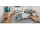 Serene bedroom with ample natural light, stylish furnishings, and decor at 5200 Brittany S Dr # 1503, St Petersburg, FL 33715