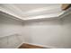 Walk-in closet with ample shelving at 5200 Brittany S Dr # 1503, St Petersburg, FL 33715