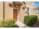 Inviting home featuring a warm brown front door and well-maintained landscaping at 555 52Nd N Ave, St Petersburg, FL 33703