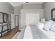 This main bedroom features hardwood floors, neutral walls, and a large closet at 555 52Nd N Ave, St Petersburg, FL 33703