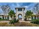 An inviting entryway surrounded by lush tropical plants in the community club at 6002 Thrushwood Rd, Lithia, FL 33547