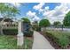 The Oasis neighborhood directional signage: club, bocce, pool/spa, pickle ball, and fire pit location at 6002 Thrushwood Rd, Lithia, FL 33547